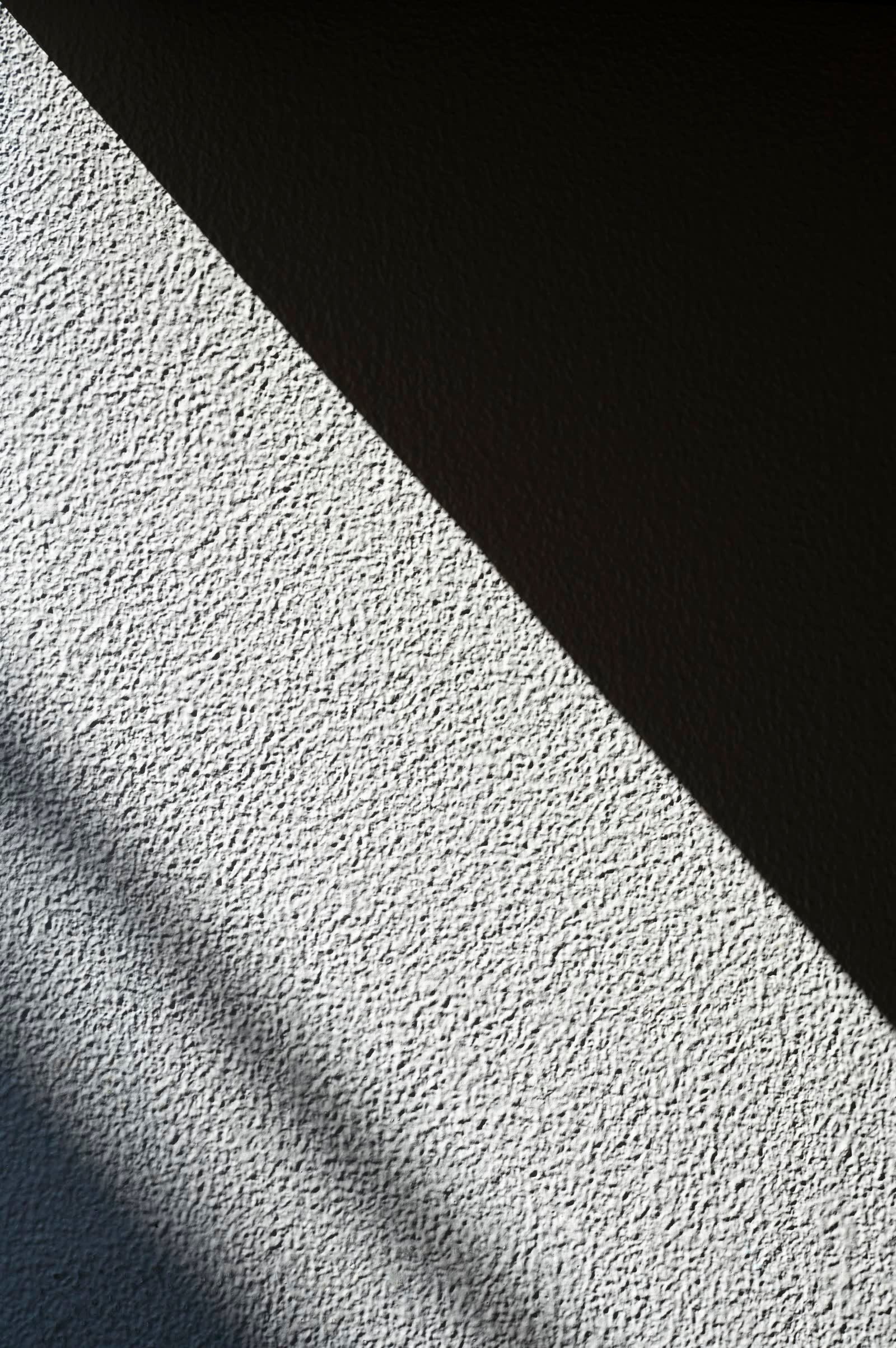 Travaux de plâtrerie et lissage sur un mur intérieur — T&M SARL, Vétroz